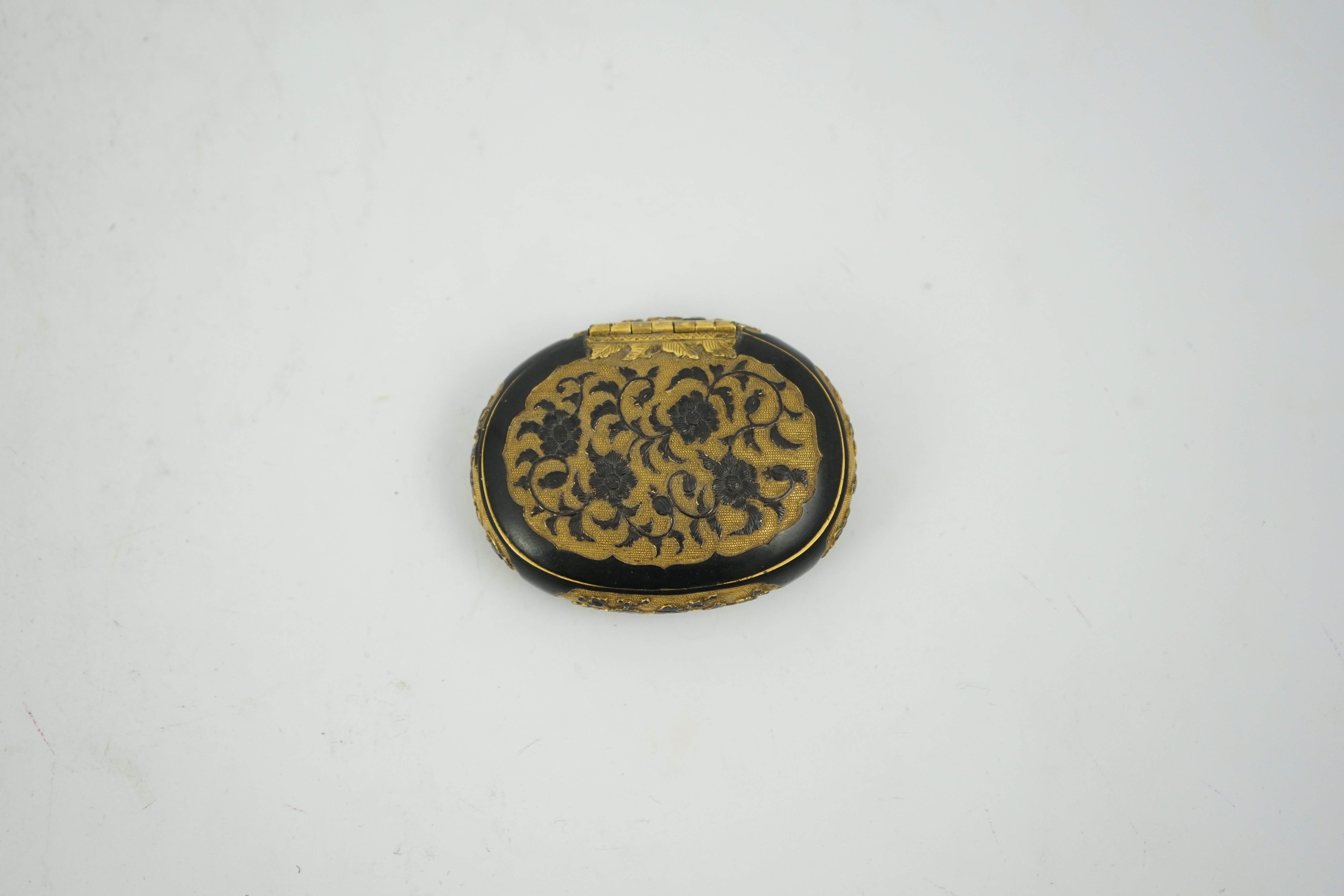 A small Japanese export gilt bronze Sawasa oval tobacco box, 18th century